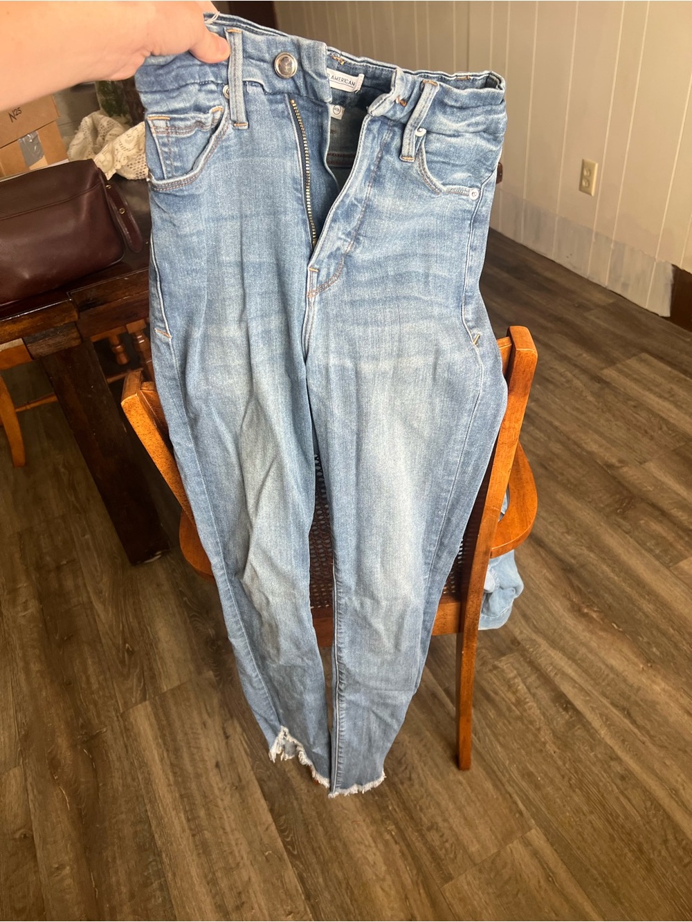 Good American Light Blue High-Rise Distressed Hem Jeans